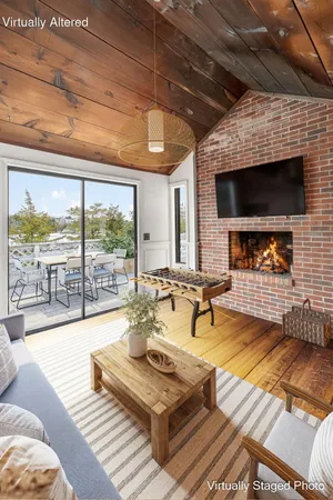 a front view of a building with tree s