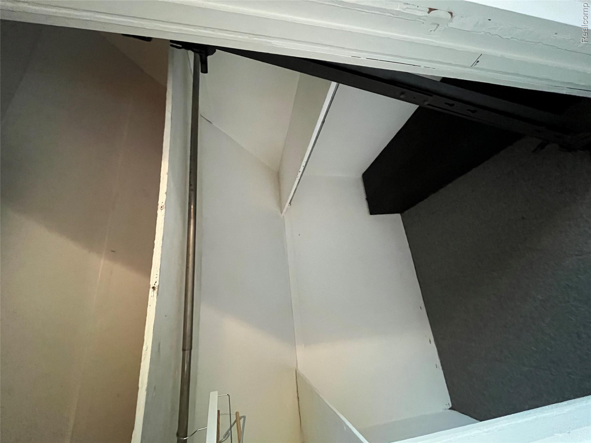 4218 Babcock Road, Unit 1 Croswell, MI 48422 - Photo 21 of 44 Walk in closet with dark carpet
