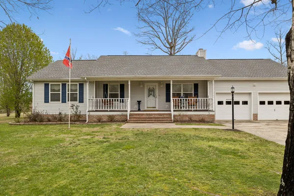 a front view of house with yard