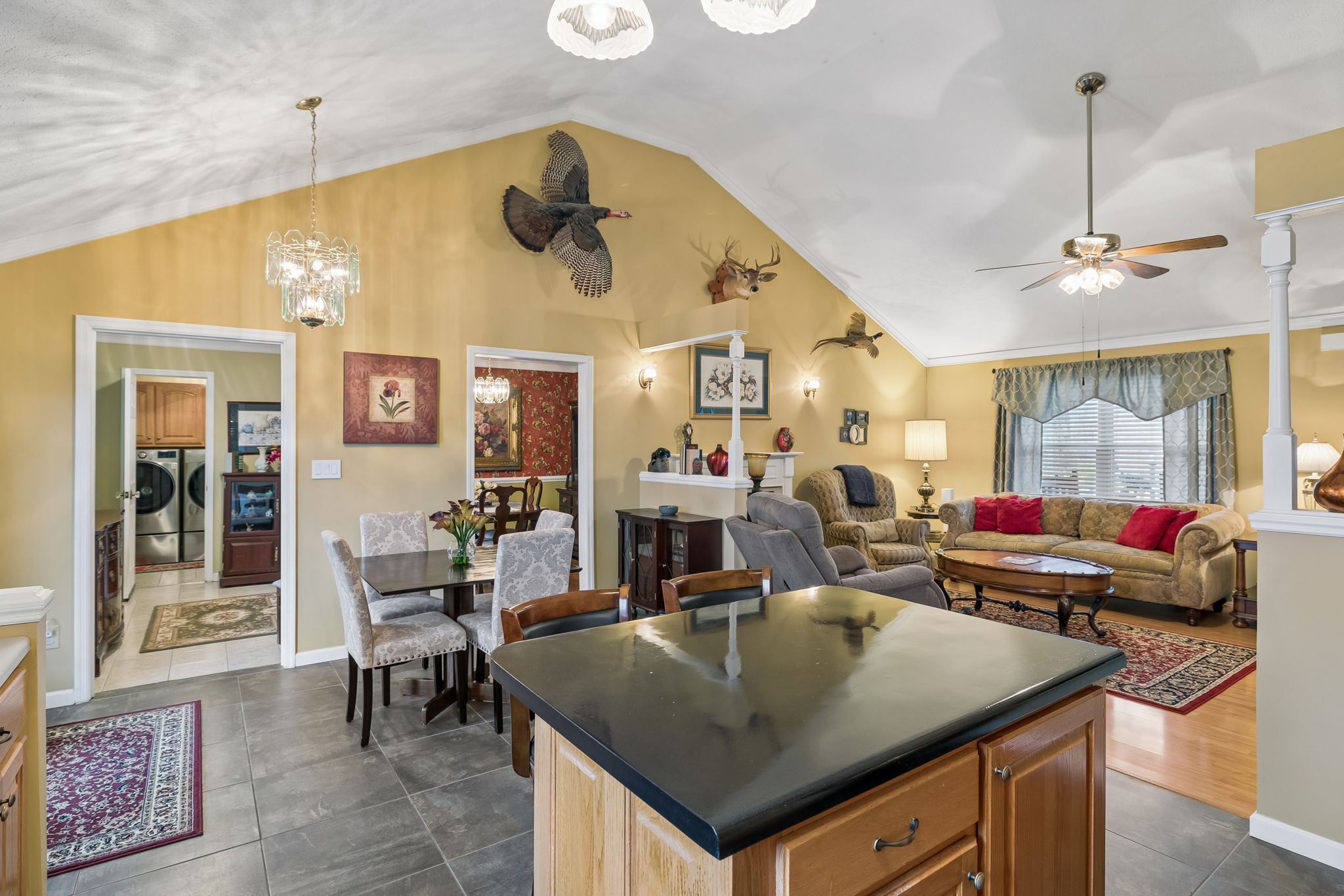 165 Pond Creek Road Summertown, TN 38483 - Photo 32 of 79 a view of a dining area with furniture and a chandelier