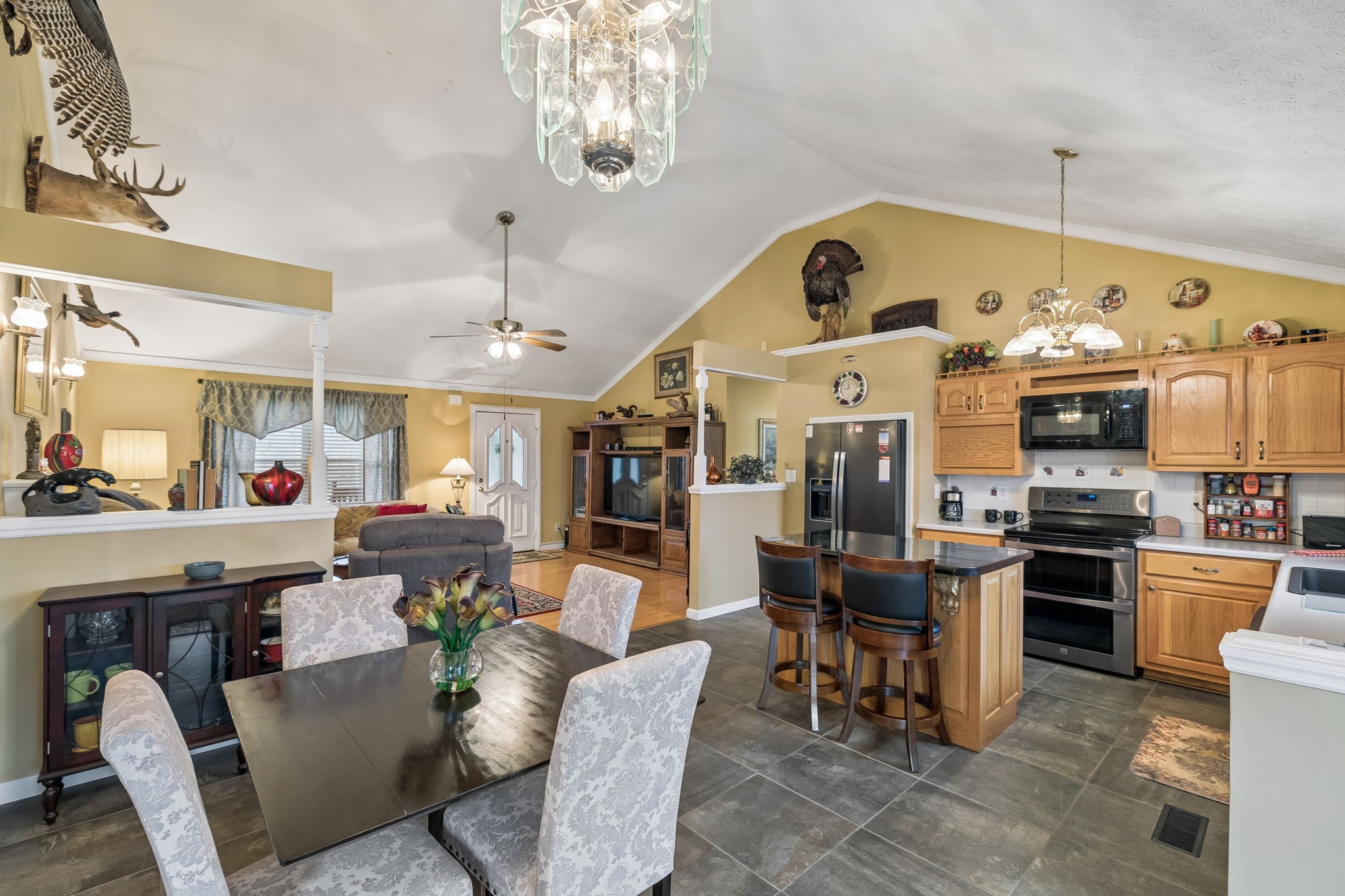 165 Pond Creek Road Summertown, TN 38483 - Photo 33 of 79 a living room with lots of furniture and chandelier