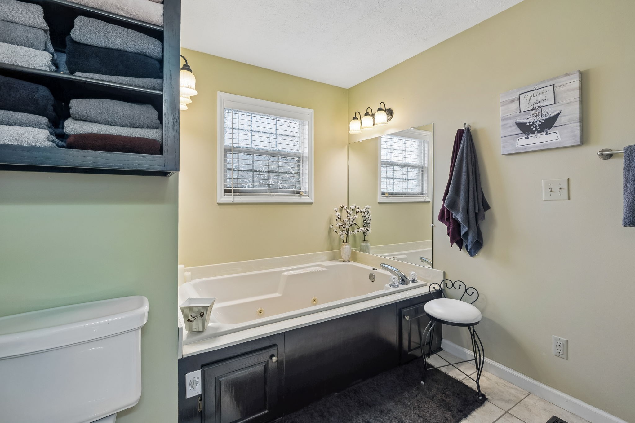 165 Pond Creek Road Summertown, TN 38483 - Photo 43 of 79 a bathroom with a sink and a bathtub
