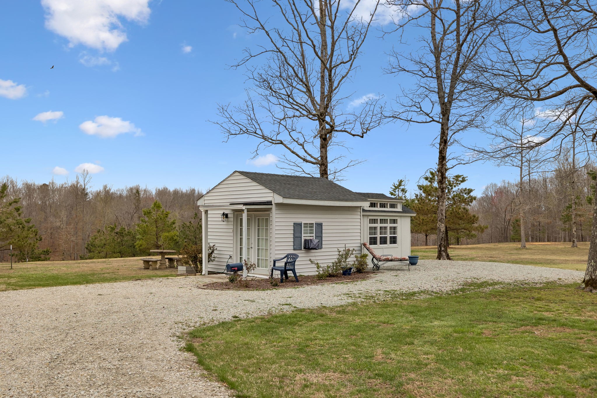 165 Pond Creek Road Summertown, TN 38483 - Photo 48 of 79 a view of a house with backyard and trees