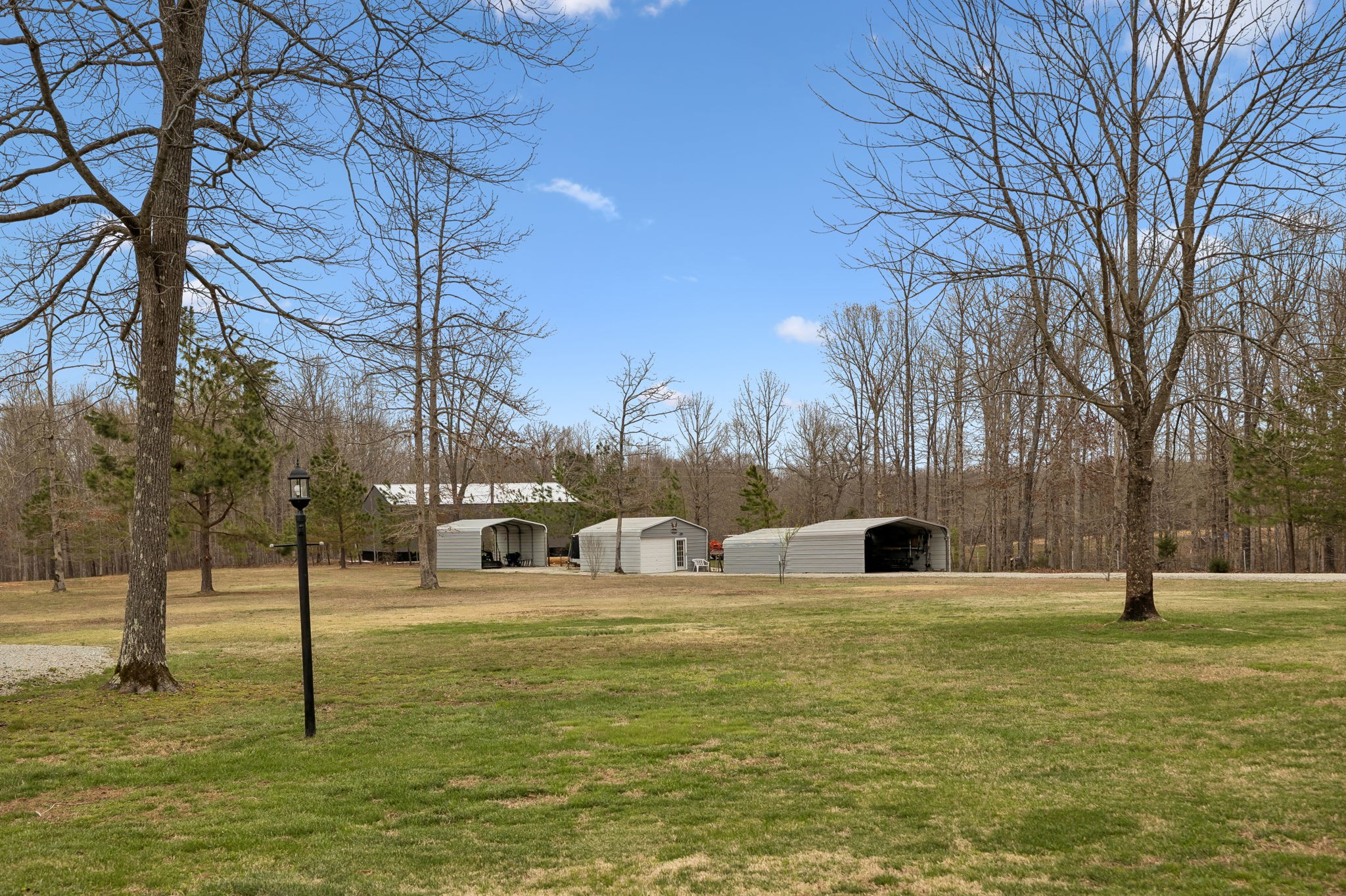 165 Pond Creek Road Summertown, TN 38483 - Photo 58 of 79 a view of a park with tree s