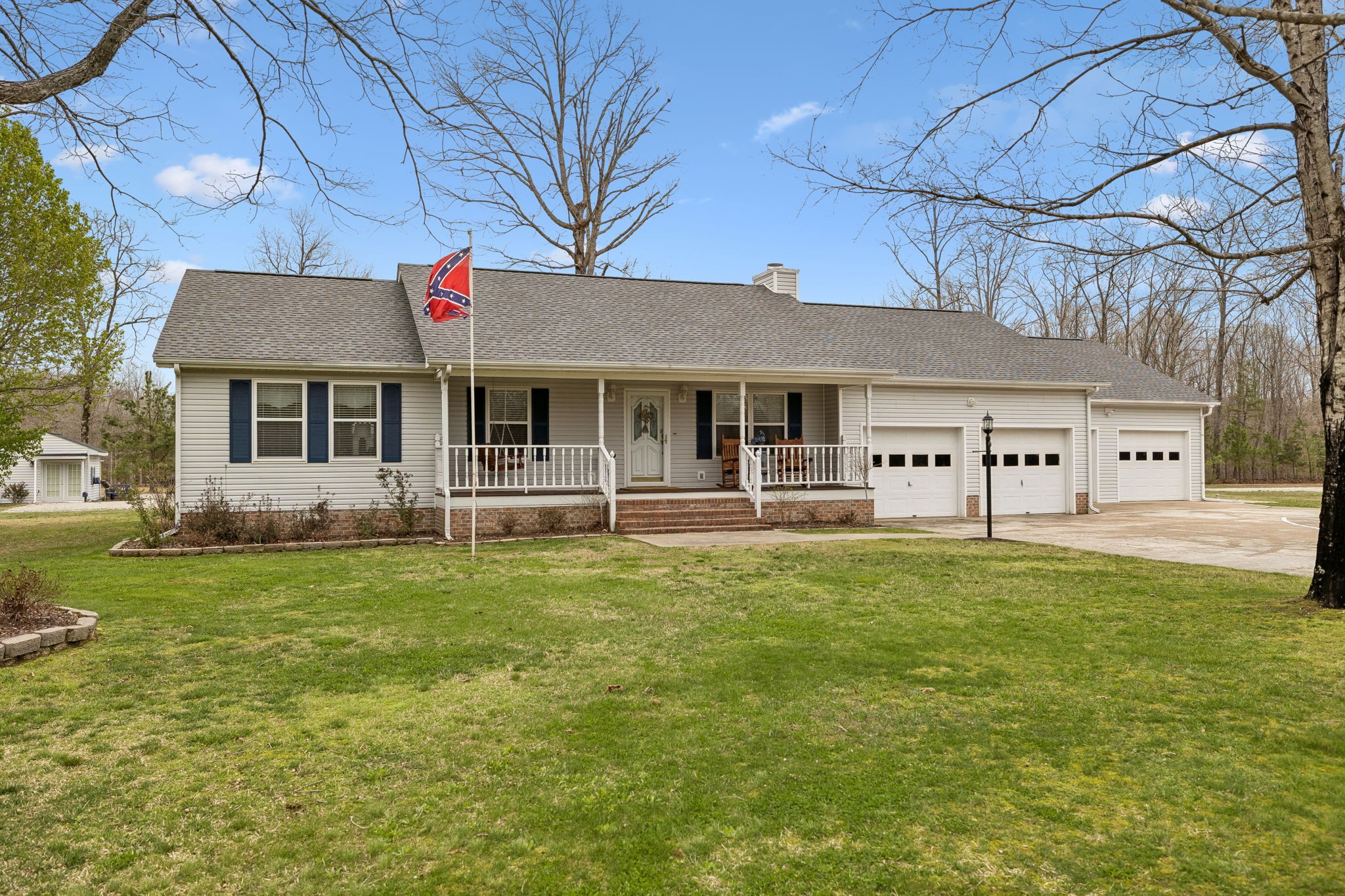 165 Pond Creek Road Summertown, TN 38483 - Photo 10 of 79 a front view of a house with a yard