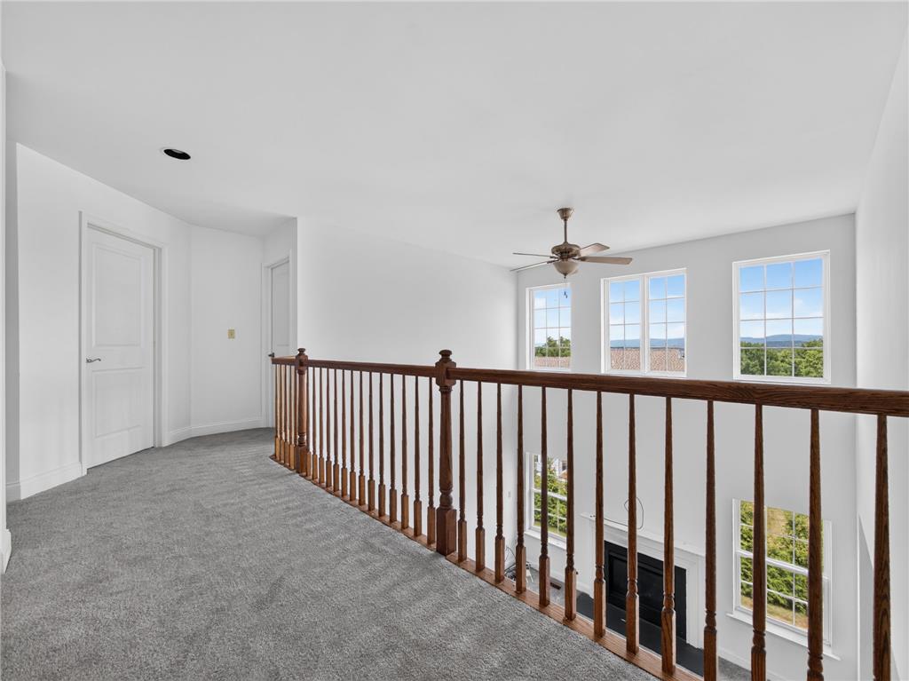 3821 Rittenhouse Road Lower Macungie Township, PA 18062 - Photo 40 of 62 A welcoming upper landing offers abundant natural light and an open view of the surrounding hills.