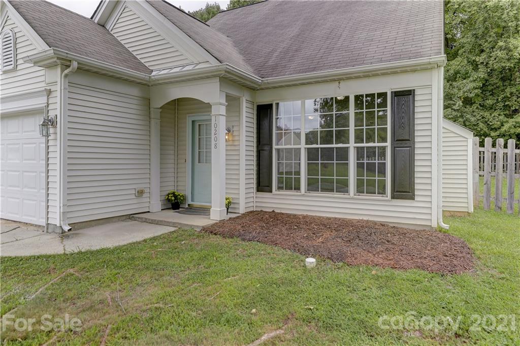 10208 Roundleaf Drive Charlotte, NC 28213 - Photo 2 of 26 a house view with a garden space