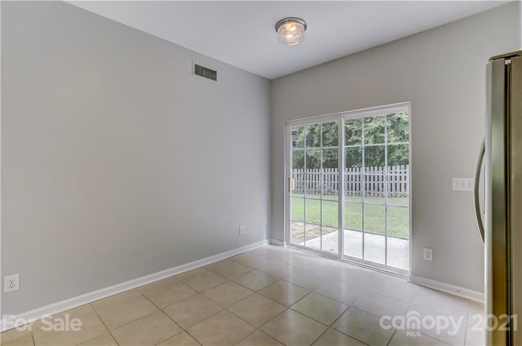 10208 Roundleaf Drive Charlotte, NC 28213 - Photo 11 of 26 an empty room with windows