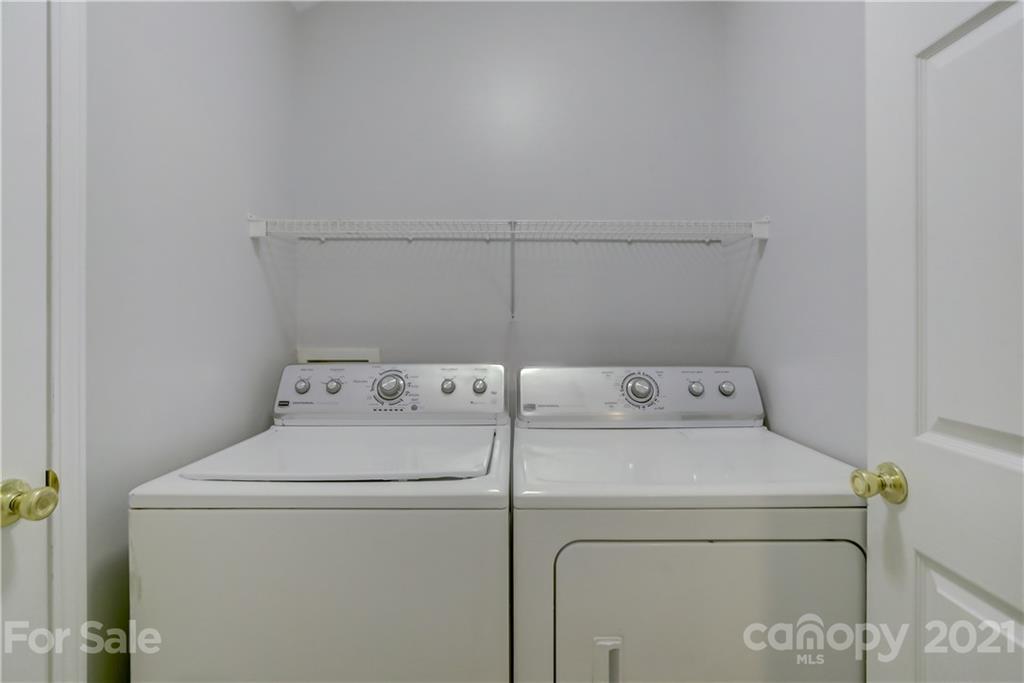 10208 Roundleaf Drive Charlotte, NC 28213 - Photo 22 of 26 a utility room with dryer and washer