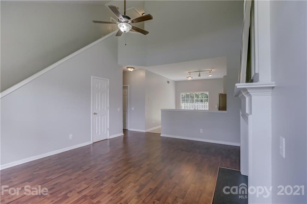 10208 Roundleaf Drive Charlotte, NC 28213 - Photo 5 of 26 a view of an empty room with wooden floor