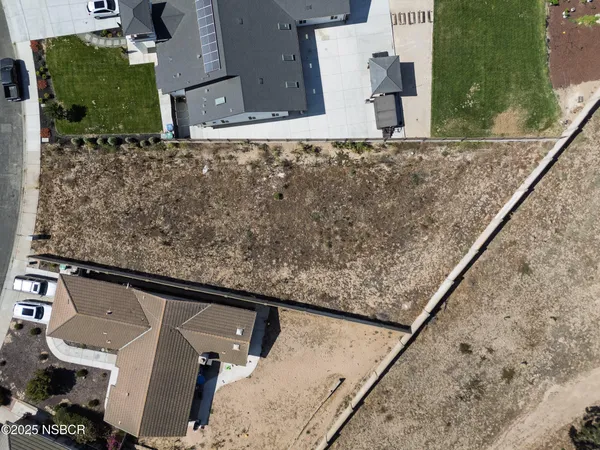 an aerial view of a residential houses
