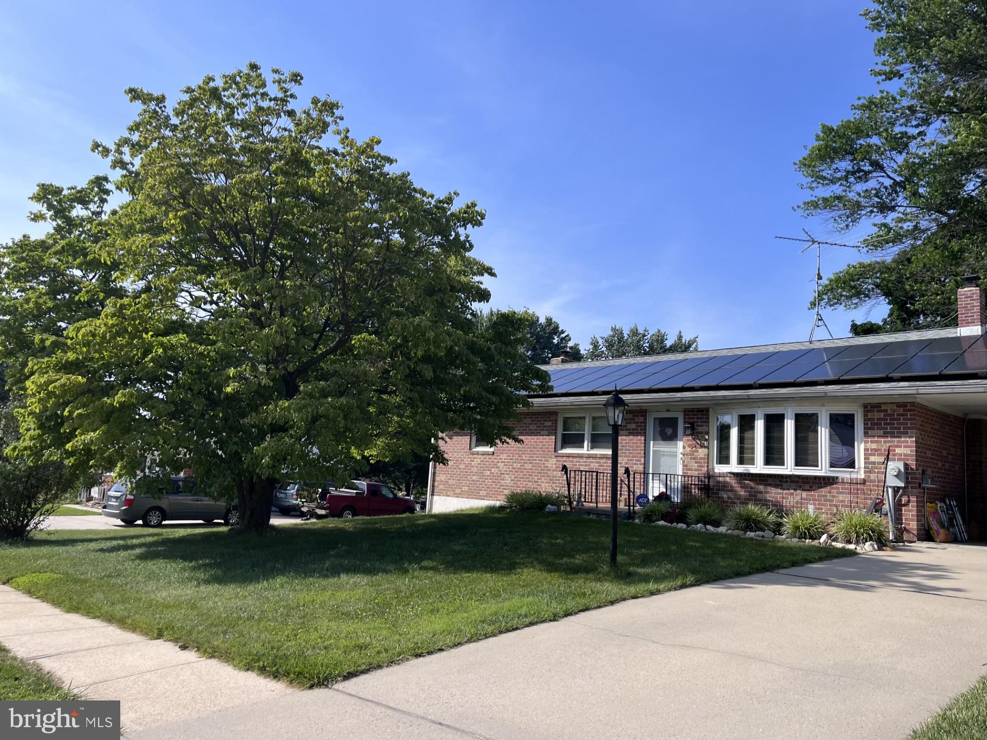 405 Harrington Road Bel Air, MD 21015 - Photo 2 of 8 front view of a house with a yard