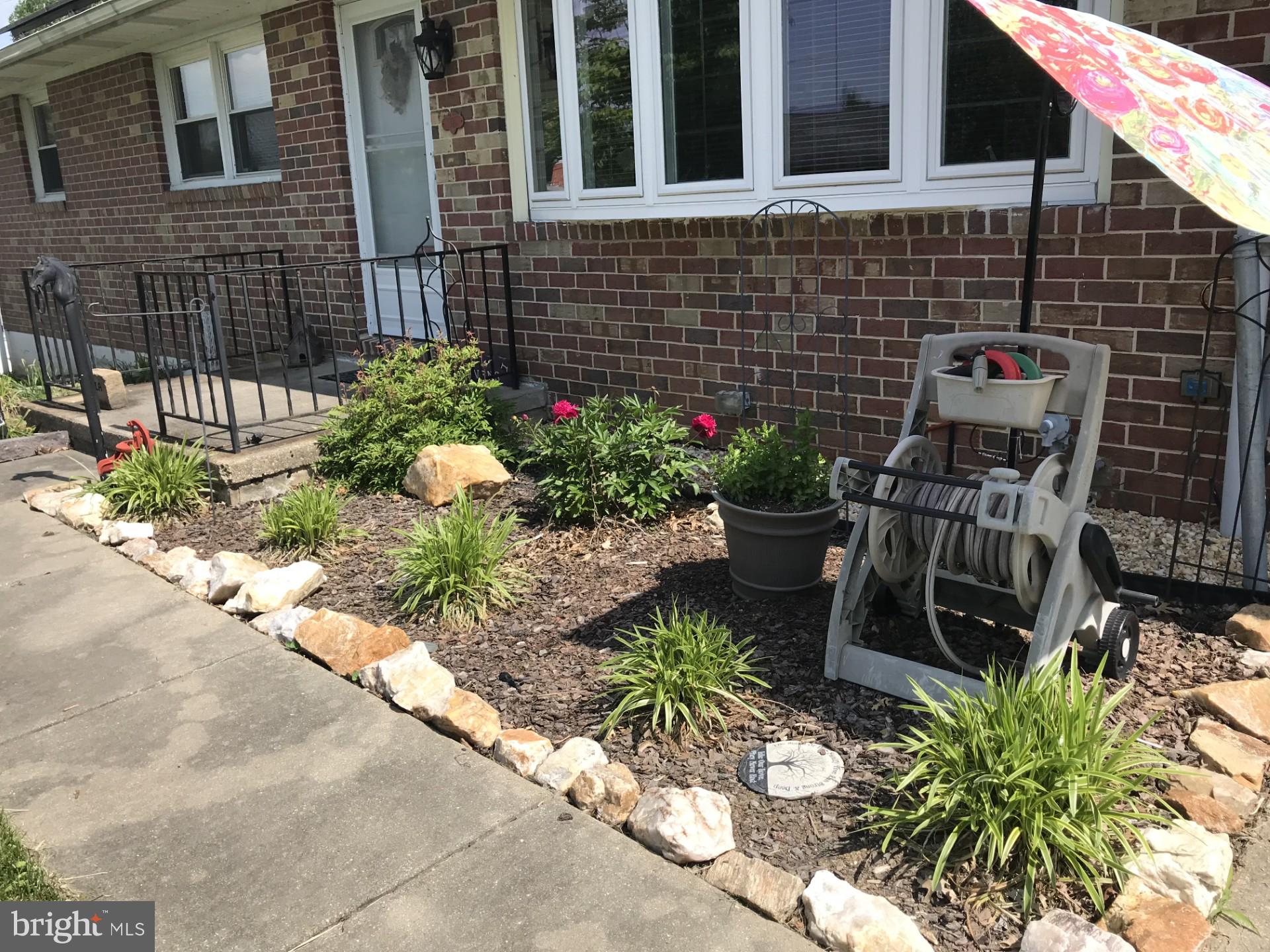 405 Harrington Road Bel Air, MD 21015 - Photo 4 of 8 a view of a chair and table in the patio
