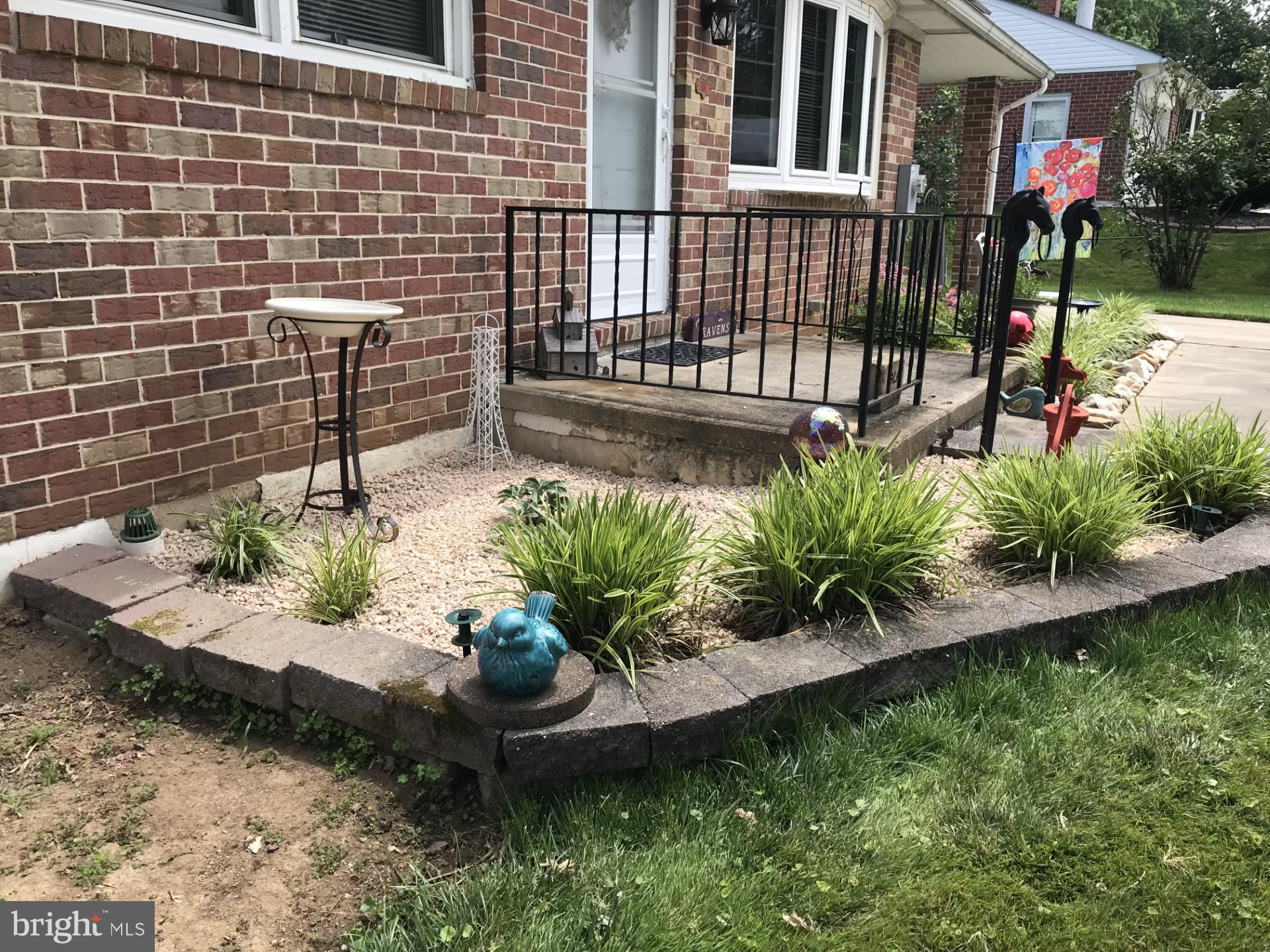 405 Harrington Road Bel Air, MD 21015 - Photo 5 of 8 a view of a chairs and table in a backyard