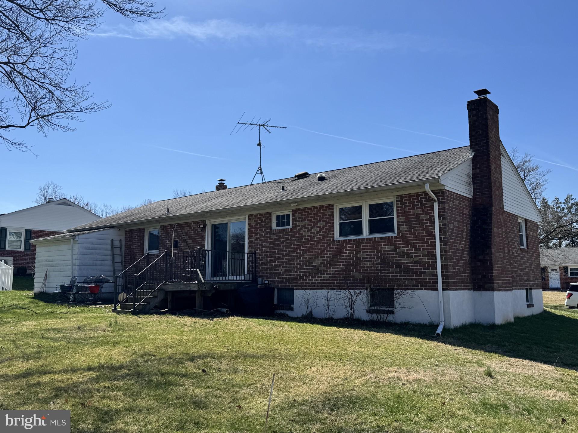 405 Harrington Road Bel Air, MD 21015 - Photo 7 of 8 a front view of a house with garden