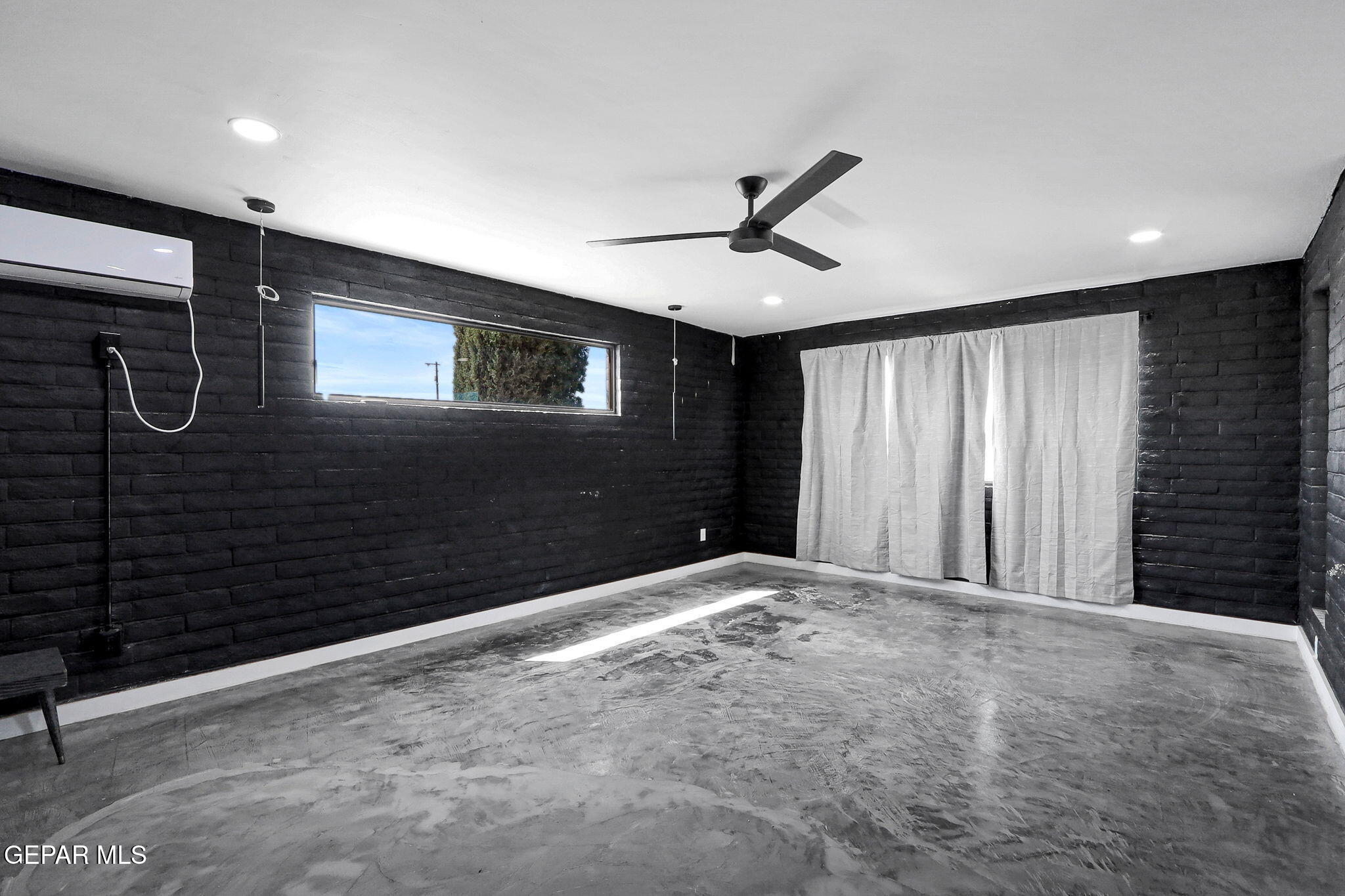 810 Gato Road El Paso, TX 79932 - Photo 24 of 73 a view of an empty room with a window