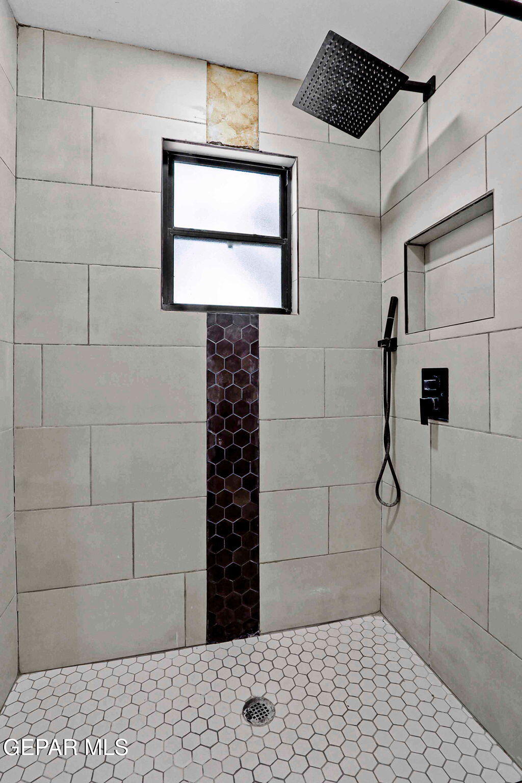 810 Gato Road El Paso, TX 79932 - Photo 37 of 73 a bathroom with a shower