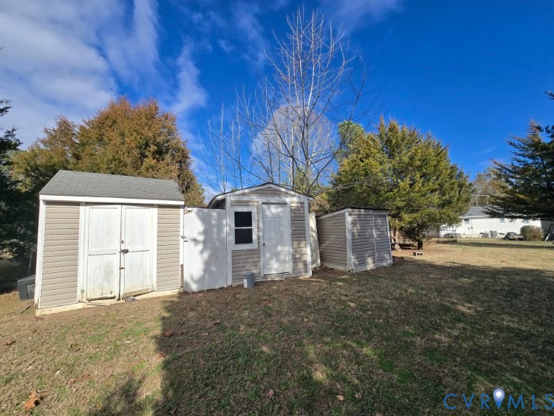 16023 Flatfoot Road Dinwiddie, VA 23841 - Photo 6 of 9 a view of a house with a yard