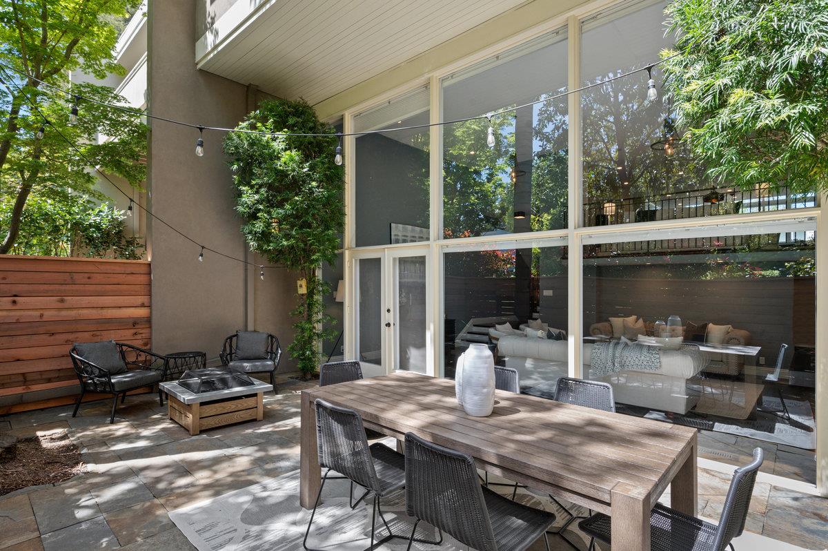 171 Forest Lane Menlo Park, CA 94025 - Photo 12 of 16 a view of backyard of house with seating space