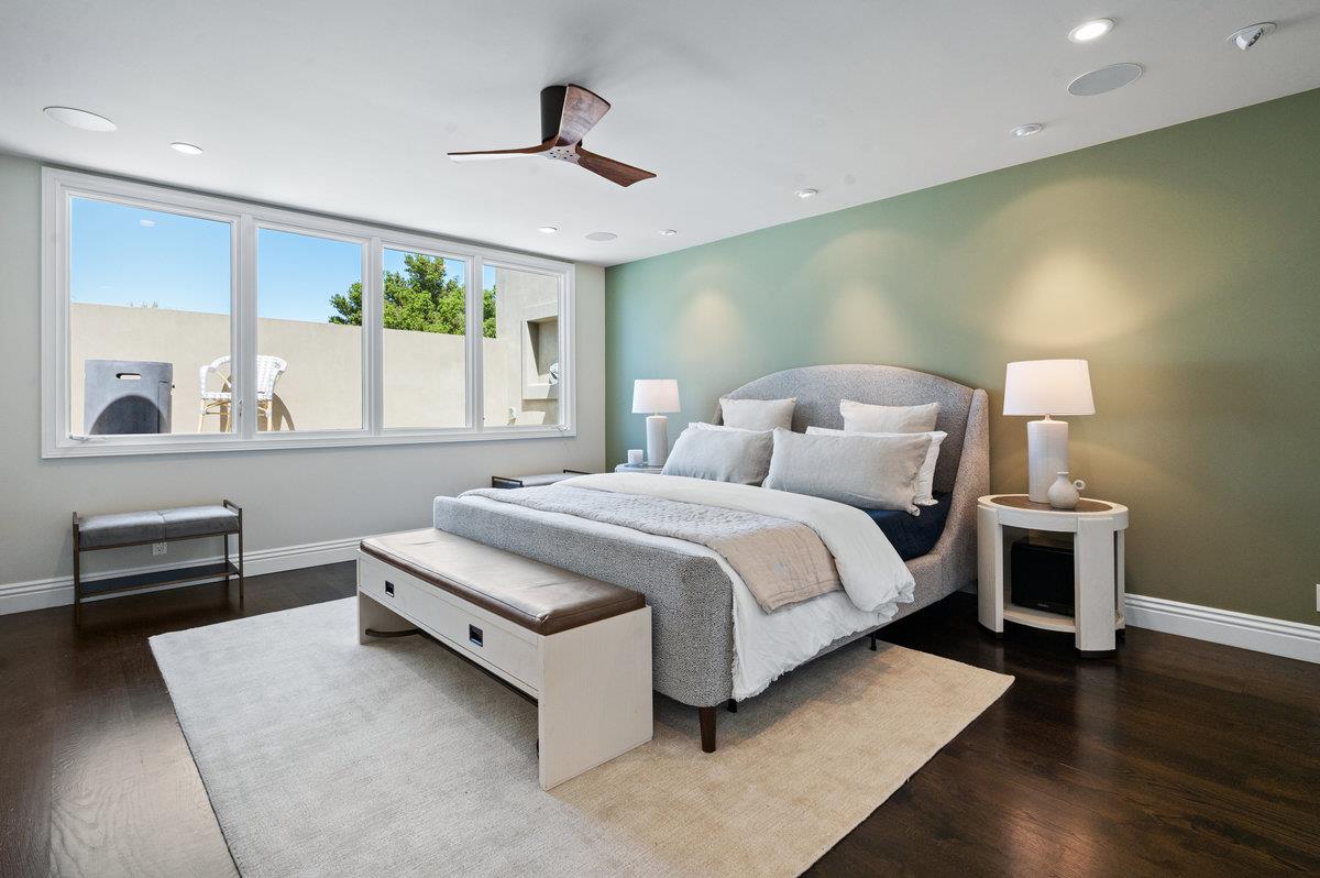 171 Forest Lane Menlo Park, CA 94025 - Photo 7 of 16 a bedroom with a bed and a chair with the outer view