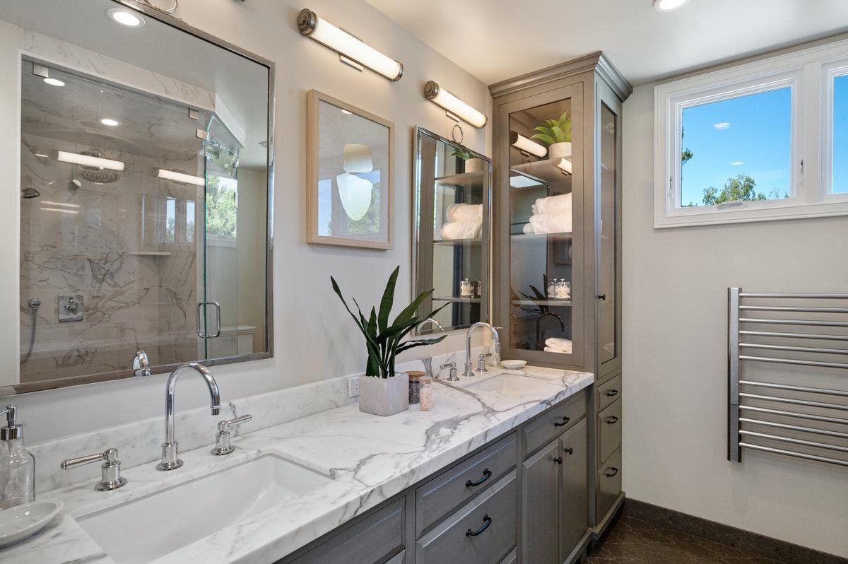 171 Forest Lane Menlo Park, CA 94025 - Photo 8 of 16 a bathroom with a granite countertop sink and a mirror