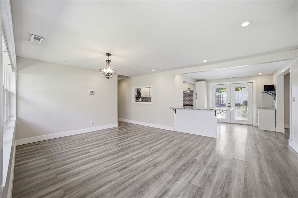 157 Errol Road Brockton, MA 02302 - Photo 13 of 34 a view of a livingroom with wooden floor