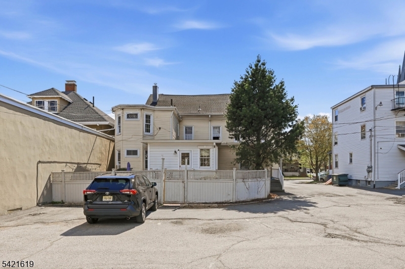104 Maple Avenue, Unit 2 Morristown, NJ 07960 - Photo 22 of 23 a car parked in front of a house