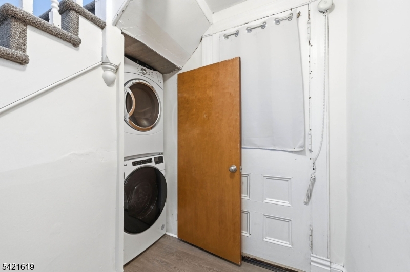 104 Maple Avenue, Unit 2 Morristown, NJ 07960 - Photo 5 of 23 a utility room with dryer and washer