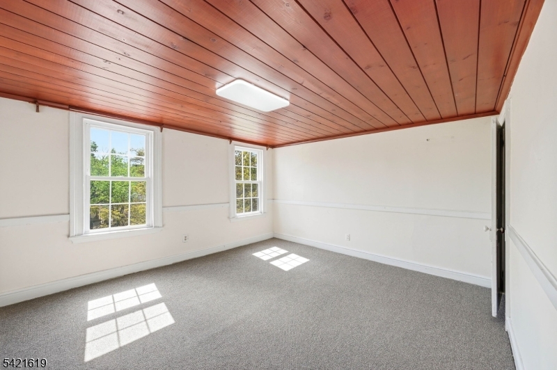 104 Maple Avenue, Unit 2 Morristown, NJ 07960 - Photo 9 of 23 a view of empty room with window