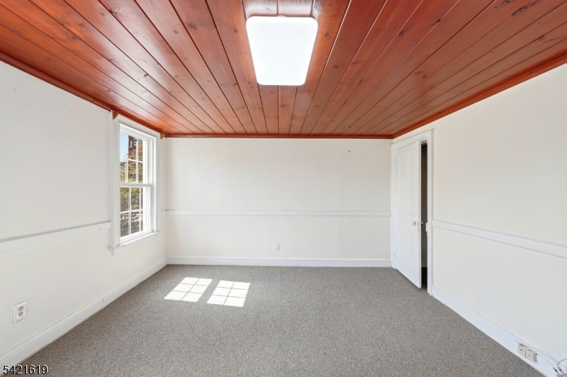 104 Maple Avenue, Unit 2 Morristown, NJ 07960 - Photo 10 of 23 a view of empty room with window