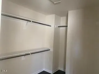 a view of an empty walk in closet