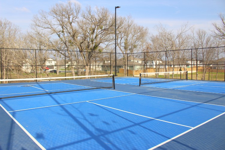 122 Hornet Street Elgin, TX 78621 - Photo 5 of 10 a view of a tennis court