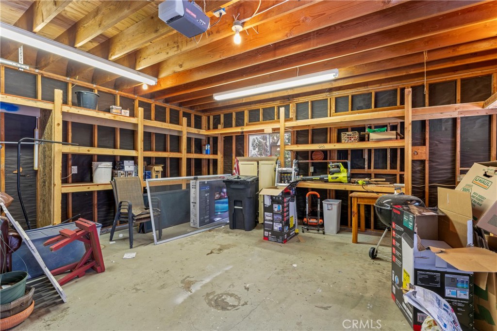 676 Rhine Road Lake Arrowhead, CA 92352 - Photo 16 of 20 a view of a workspace with furniture