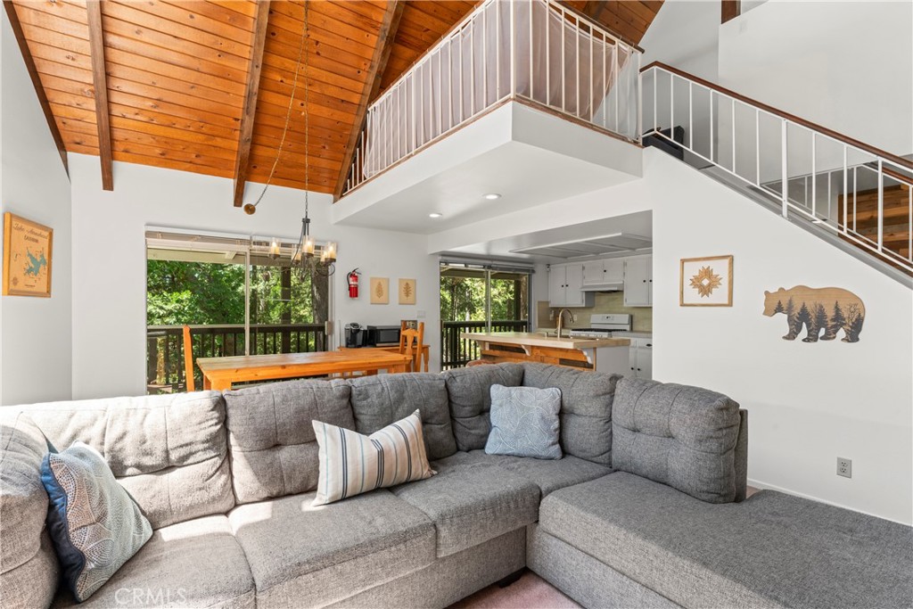 676 Rhine Road Lake Arrowhead, CA 92352 - Photo 7 of 20 a living room with furniture and a large window