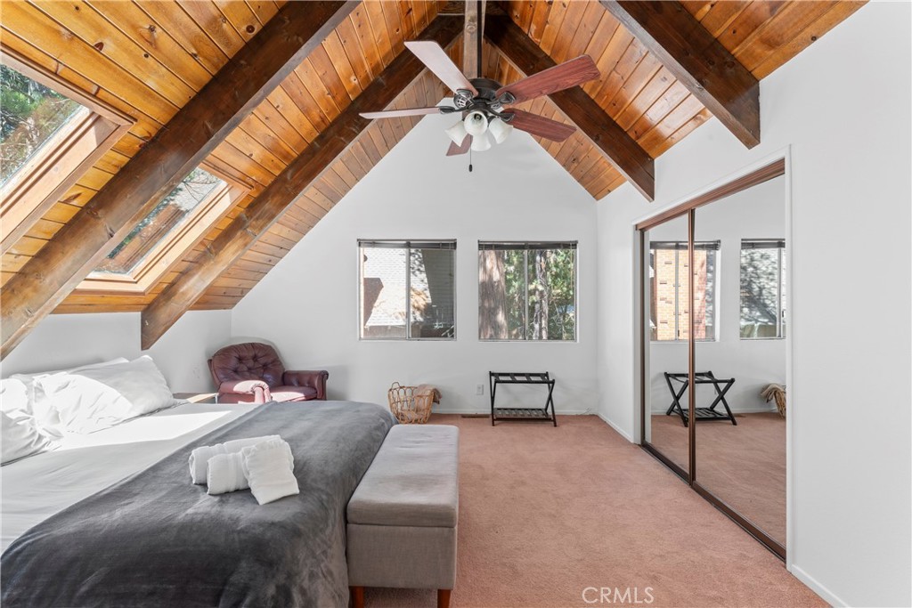 676 Rhine Road Lake Arrowhead, CA 92352 - Photo 9 of 20 a view of a livingroom with furniture and windows
