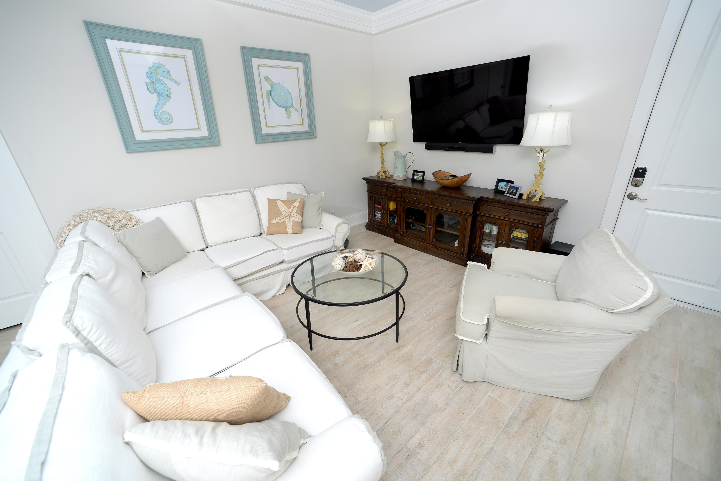 207 Killane Drive Jupiter, FL 33458 - Photo 49 of 59 a living room with furniture and a flat screen tv