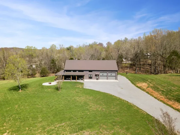 a view of a house with a big yard