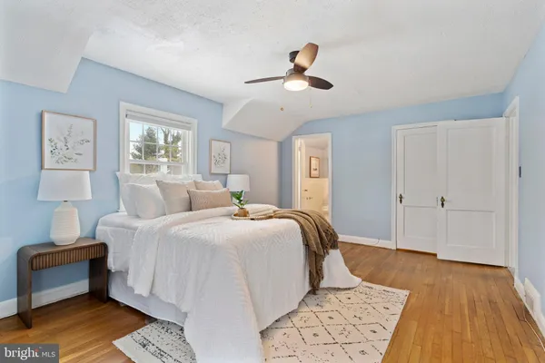 a bed room with a bed and a couch