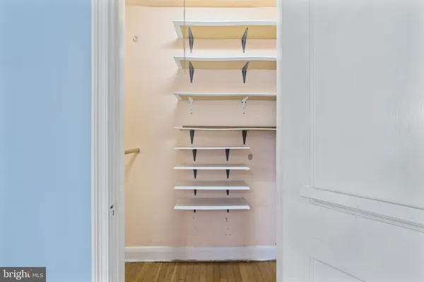 a view of an empty walk in closet