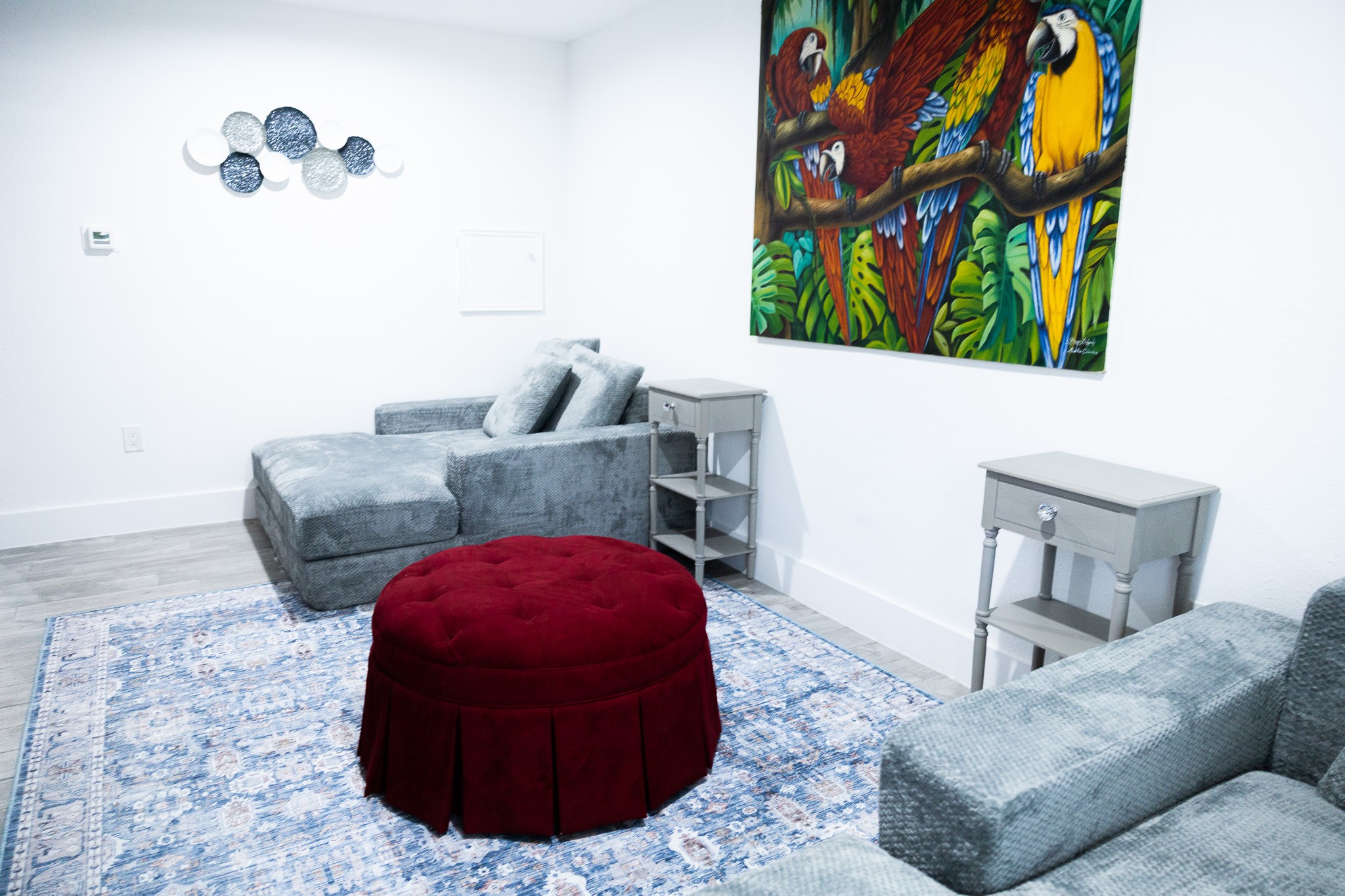 10463 Alcott Drive, Unit B Houston, TX 77043 - Photo 9 of 11 a living room with furniture and painting on the wall