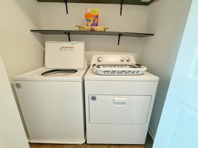 a utility room with dryer and washer