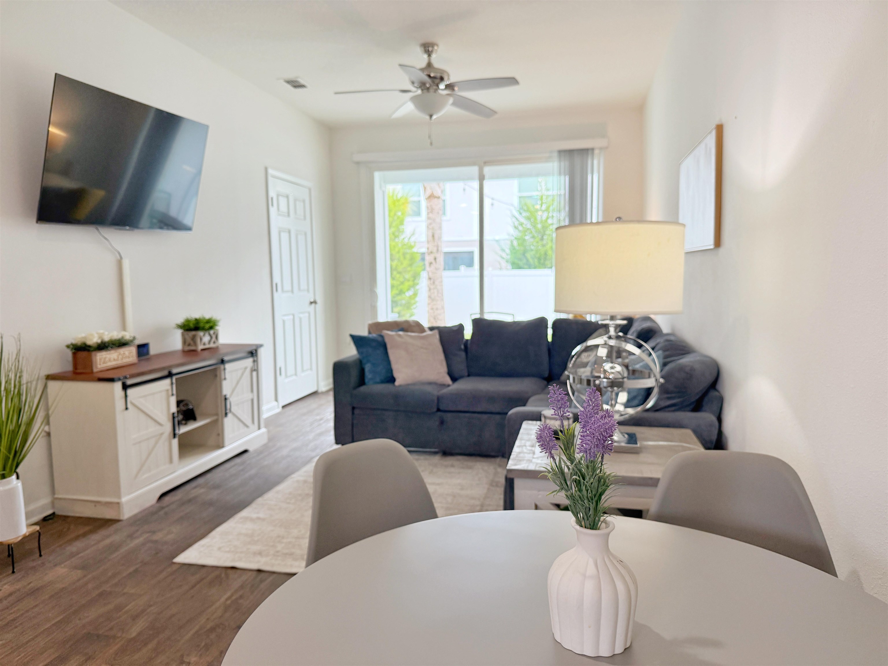 98 Vidalia Ridge Rd Street St. Augustine, FL 32084 - Photo 10 of 26 a living room with furniture and a flat screen tv