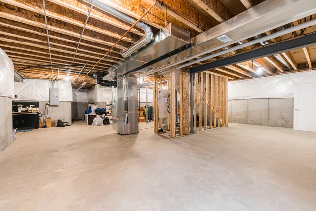 an aerial view of a house with outdoor space pool seating area and yard