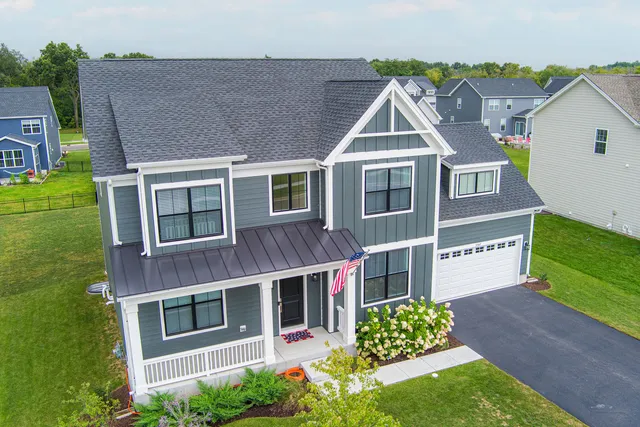 a aerial view of a house with garden