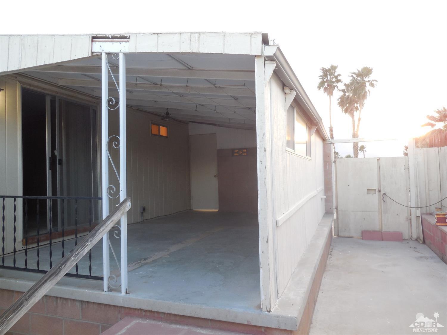 16820 Sunrise Road Desert Hot Springs, CA 92241 - Photo 19 of 19 a view of a house with terrace