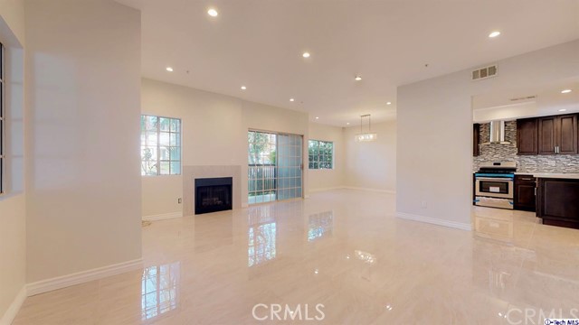 1245 Grandview Avenue, Unit 4 Glendale, CA 91201 - Photo 2 of 20 a view of a kitchen with a sink and a refrigerator