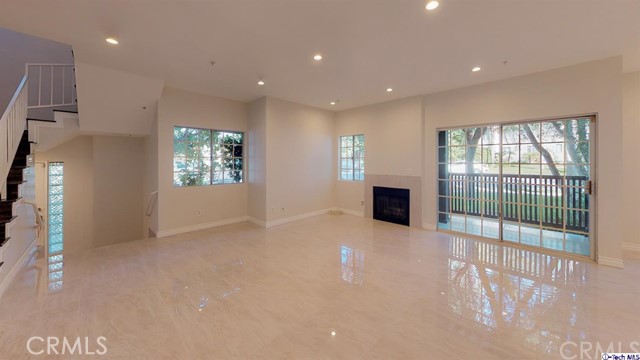 1245 Grandview Avenue, Unit 4 Glendale, CA 91201 - Photo 4 of 20 a view of an empty room with a window