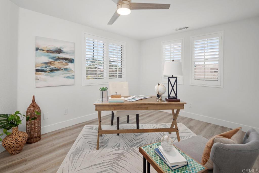 6160 Paseo Tapajos Carlsbad, CA 92009 - Photo 17 of 28 a living room with furniture and window