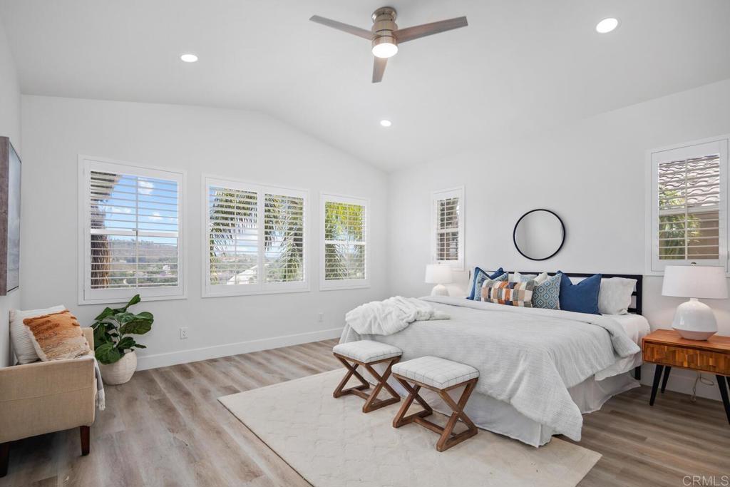 6160 Paseo Tapajos Carlsbad, CA 92009 - Photo 23 of 28 a bed room with furniture and a window