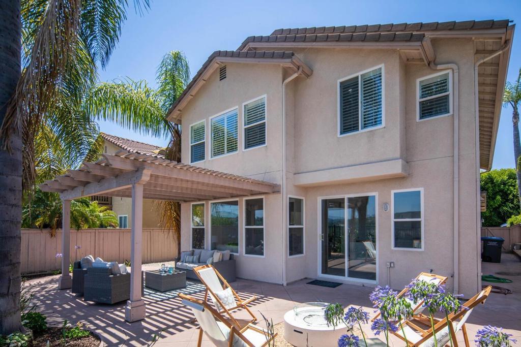 6160 Paseo Tapajos Carlsbad, CA 92009 - Photo 4 of 28 a view of a house with a patio